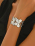 Lxalry Platinum Plated Stainless Steel Floral Carved Mirror Bracelet -Hypoallergenic The Aurora Touch
